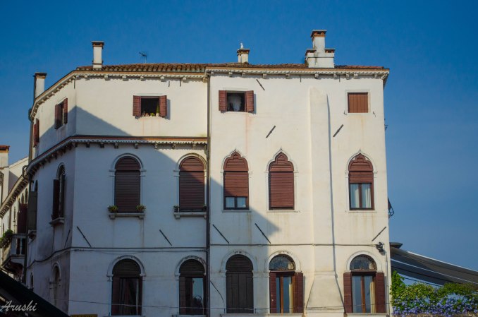 brown shutter Venetian window